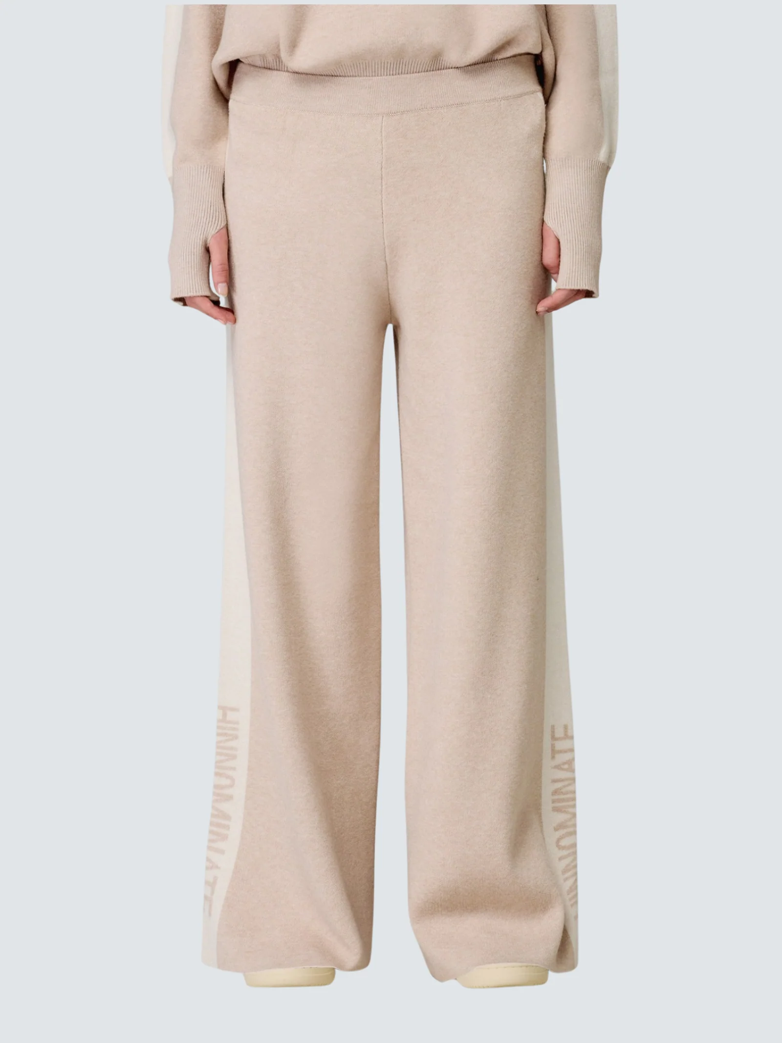 Pantalone a palazzo Hinnominate beige con bande in contrasto e logo