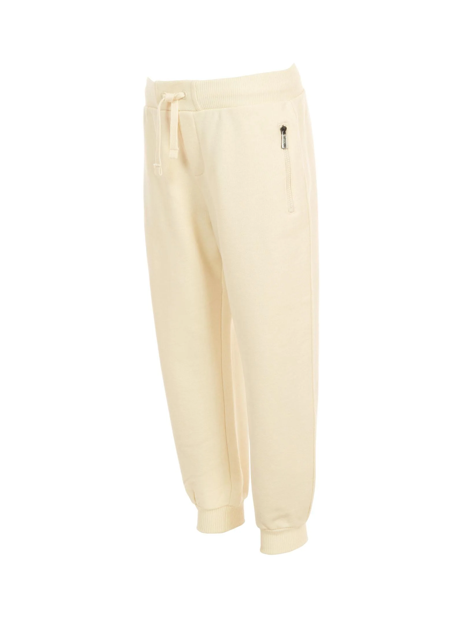 Pantalone in tuta Moschino avorio con tasche a zip e logo effetto pittura - Image 2
