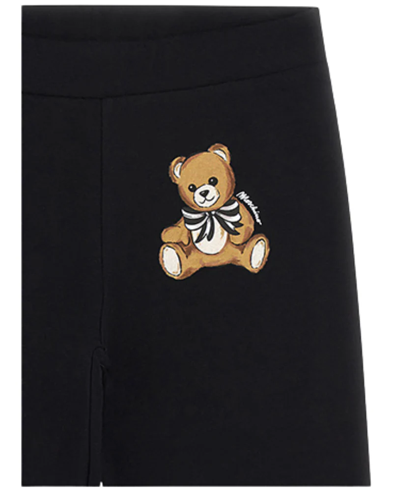 Pantalone Moschino nero con orsetto inconico stampato sulla gamba - Image 2