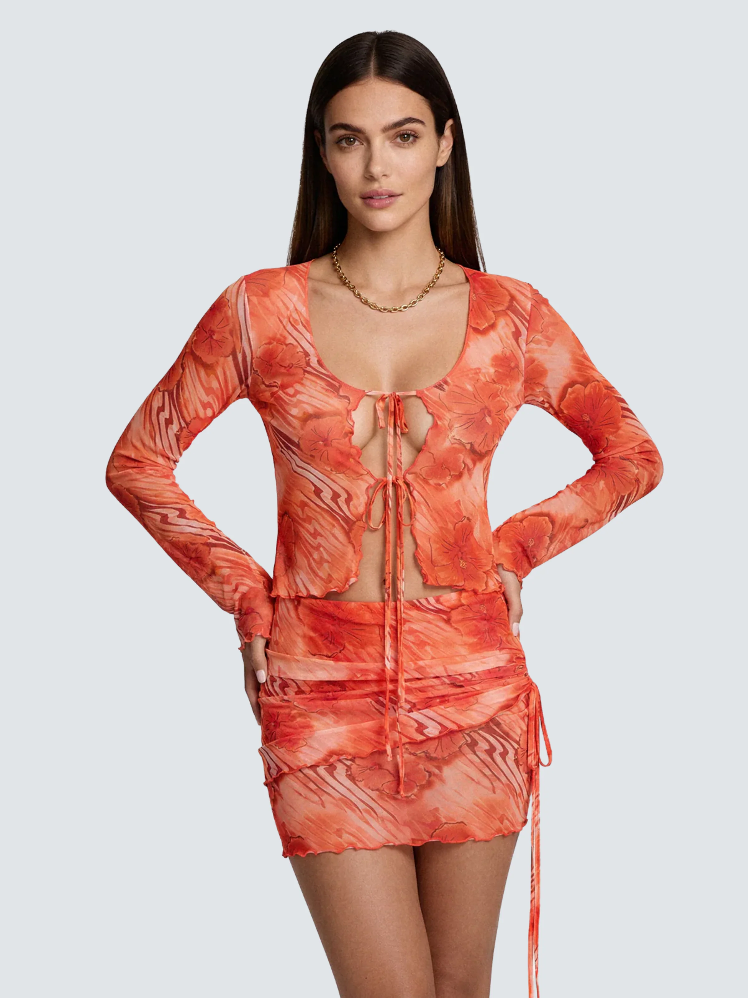Top a maniche lunghe Me Fui arancione fantasia floreale
